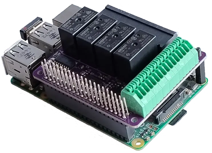 qPIO Raspberry Pi IO HAT mounted on a Pi, showing 4 relays and professional push-in terminal blocks.